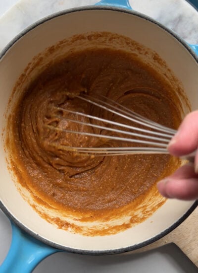 peanut butter and maple syrup warmed up together in a saucepan.