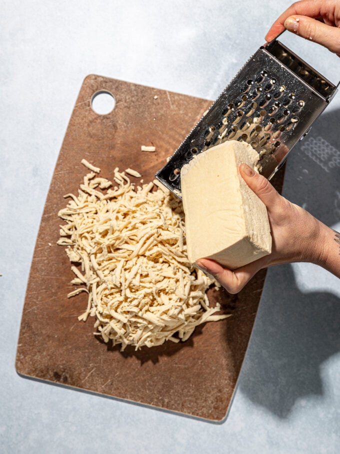 hand grating tofu