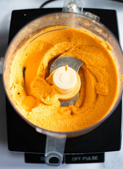 buffalo hummus pureed in a food processor. 